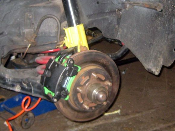 Stock brakes so far with Green stuff brake pads, Eibach springs, restored control arms, poly bushings and so on.