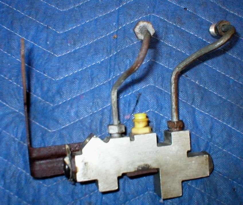 Here is an example of the 5-port I have now. Two on the top run to the MC, the third and the two on the bottom run to the calipers. 