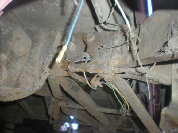 driver side rear frame see the giant whole/ cut its right behind the bumper/hitch supports
 and i have yet to fix this problem but soon i will have a new frame