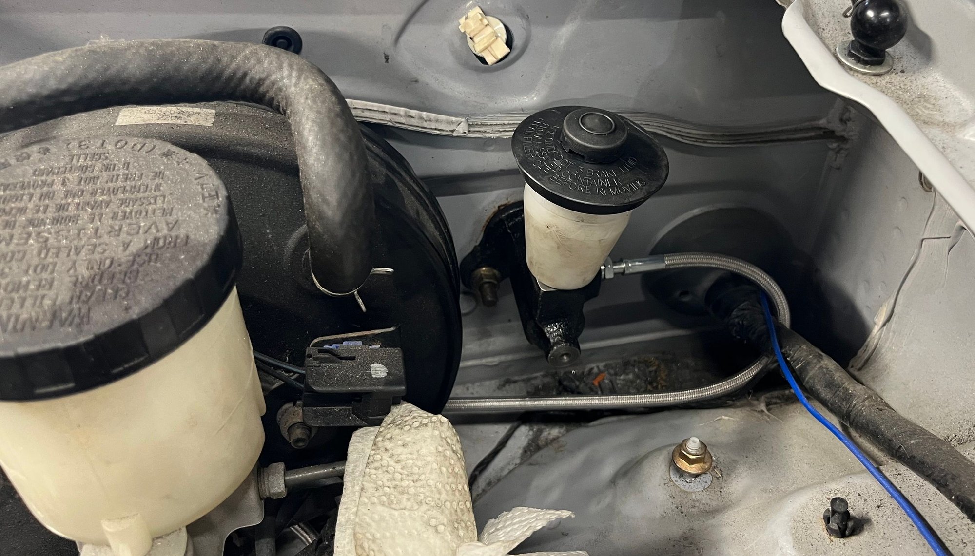 From the engine compartment with flexible line