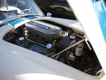 427 Ford with dual 4bbl. carbs.
