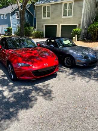 Here she is parked next to my other Miata.
