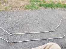 Pic of the stainless 5/16" lines i bent, i drilled and tapped threads into the frame. They come down from motor run along frame and jump over the trosion bar mount then high pressure rubber hose from the pump. I started with reg fuel line at first but figured out while heading home luckily that they dont handle fuel pump pressure very well.