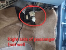 Passenger foot-well, far right/outer side. Three loose connections