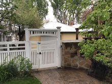 Snow on the roof of the Toyota garage.