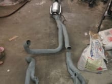 replaceing the std toyota zorts system, with set hurricane headers ,new 2 1/2 inch hiflow 400cpi cat & 2 1/2 inch hiflow muffler no rear resonator 2 1/2 inch manderal bent pipe from headers to rear truck