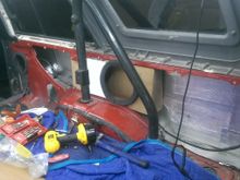 Mounted with one of the supports replaced and the hole cut in the box to match the side panel.  Removed the tail light wire and ran it through the side area under the box in the back