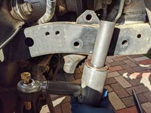 I tacked the first tube and held it in place for fit test. I am using 3/4 " heim joints. This presents a little problem as the holes are 3/4" and the bolt on the stock idler arm is .45". I got 3/4X1/2" sleeve bearings and grade 8 bolt. I decided to get 3/4 X 5/8" sleeve bearings and drill the center link hole out a bit. This is because the hole is tapered for the ball joint and I believe this hole will get loose through the years if only the end is actually snug against the 1/2" bolt.