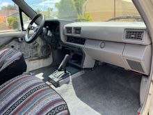 Where I'm at now. Fixed all the cracked plastic, painted, good used dash pad, rebuilt shifter and did some preemptive wiring for upgrades later. Oh and new carpet.