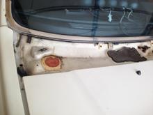 Passenger side area - cowl removed
The red circle is a rubber patch that I added to keep the water out of the fresh air box due to the HOLE I drilled