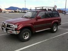 1990 Landcruiser VX.
Right Hand Drive
4.0 Gas Engine.
Bedliner Edition, comes with a bed in the back and a sink and a stove.

The ladder and rack are a nice touch too.