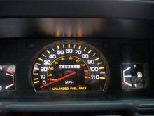 I polished out front side of gauges, sanded off green backlight, added orange transparent vinyl, wired up 30 white leds, installed led dimmer and repainted the needles fluorescent orange.