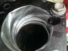another shot of the LCE Throttle Body Spacer kit.  I used a die grinder with a 1/2" round double cut burr to continue the venturi sweep into the neck or throat of the upper intake plenum.