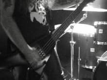 Me and my Flying &quot;V&quot; Metal Man bass (designed by Dimebag Darrel of Pantera). Pic is in some toilet hole in Manchaster,Md. somewhere.