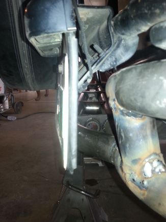 The tire carrier isn't fully closed license plate needs raised about 1.5"