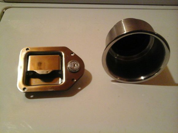 I bought some goodies awhile back. Stainless steel cupholder and stainless latch/lock
