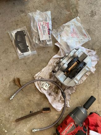 New parts and caliper put together with all hardware 