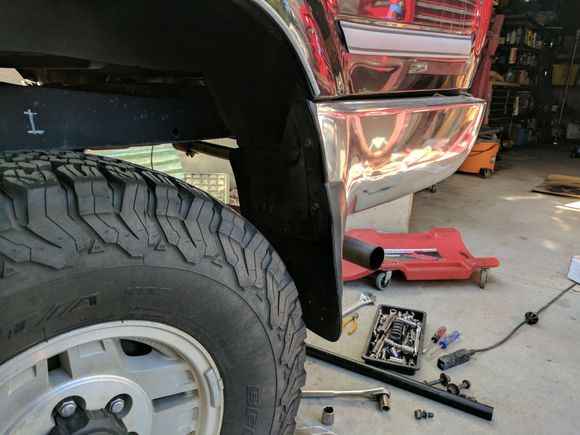 Unfortunately the nice mudflaps go away with this change... :/