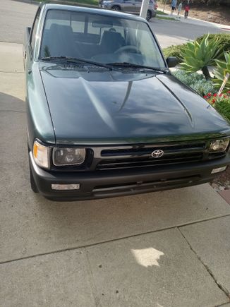 Showing LED Headlights, clear turn signals Plasti-Dip painted fender, wipers and window trim, tinted window top trim.