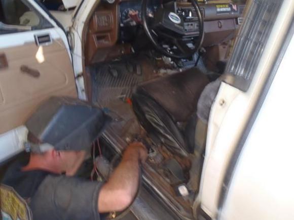 Seat mount rotted out. Welded on some channel, way nicer to drive when not in a rocking chair!