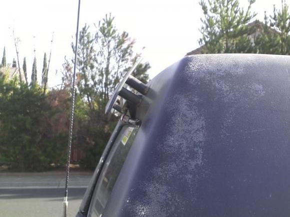 The easiest way to mount one of these... pieces of an old ATV rack and a couple dollars in new hardware.

It's just drilled straight through the top with nylon lock nuts and flat washers on the inside.  The bolts are S.S. carriage bolts that lock themselves in the wing's holes perfectly!