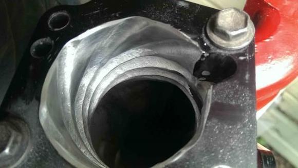 another shot of the LCE Throttle Body Spacer kit.  I used a die grinder with a 1/2" round double cut burr to continue the venturi sweep into the neck or throat of the upper intake plenum.