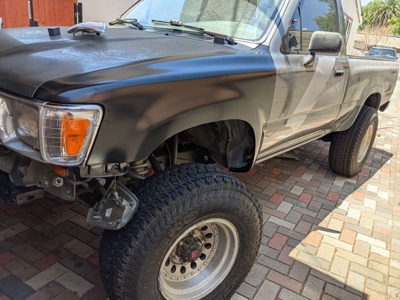 Installed all the 4runner stock pieces on the truck. Need to weld couple of rubber mounts back on still. Also, test fit the new fenders. The hood you see here is stock to this car, came with it in the bed. 